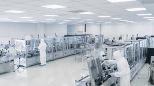 sterile,high,precision,manufacturing,laboratory,where,scientists,in,protective,coverall's
